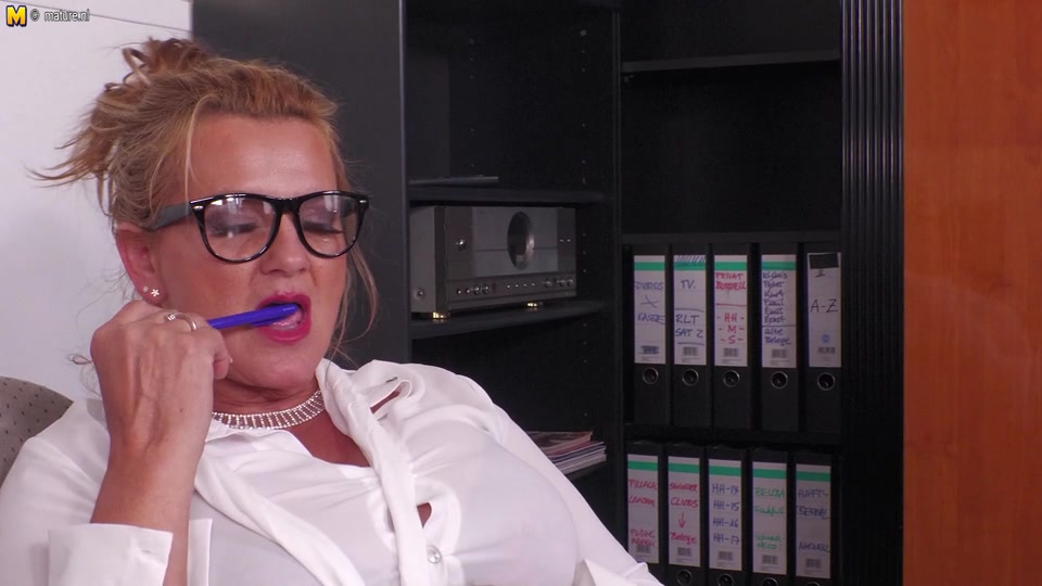 German Milf secretary shows great rack and masturbates