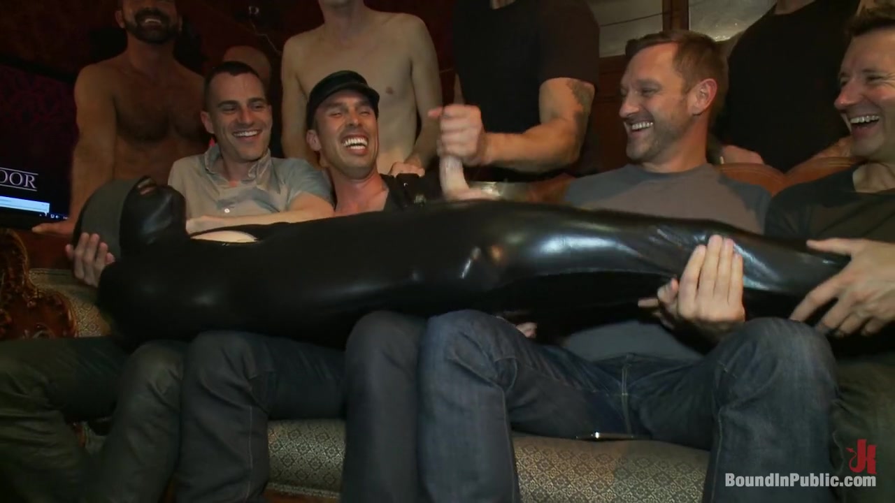 Big cock slave is publicly humiliated and caught in the cum fest.