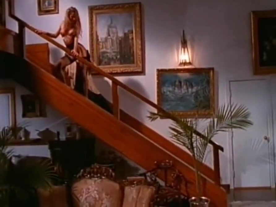 Gorgeous Redhead Babe Doing It On The Stairs