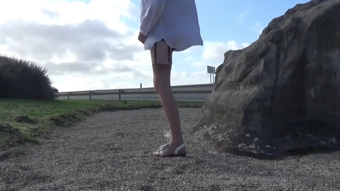 Crossdresser Sissy On A Road Parking Lot Sounding In Garter