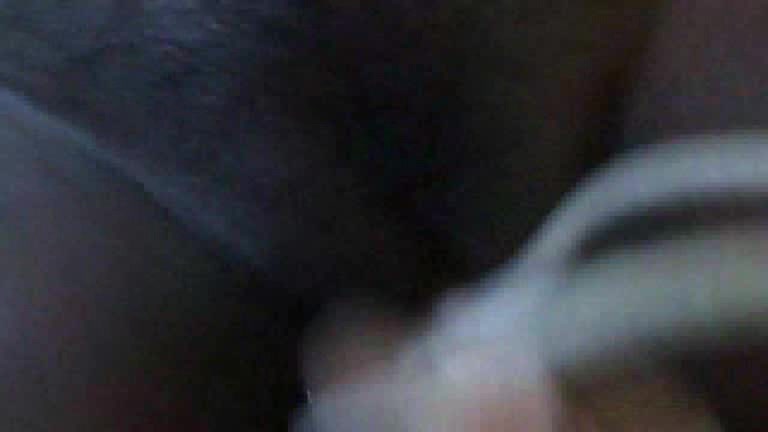 Black skinned girl has something inside her pussy