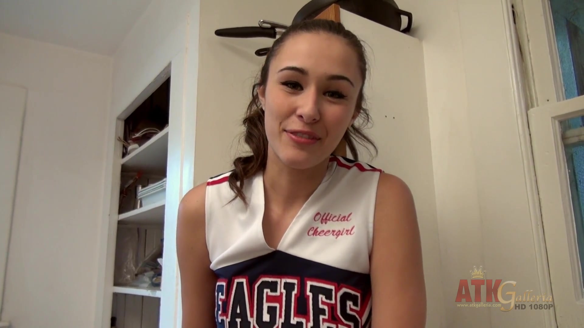 Young Bailey masturbates in the kitchen