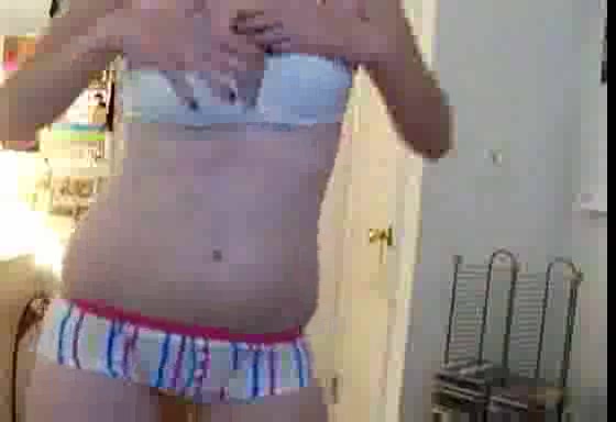 Pussycat poses in front of the webcam in stripped undies