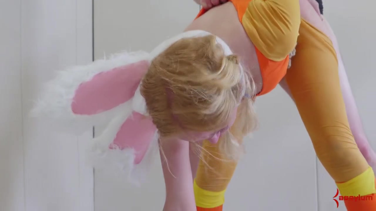 Cosplay babe is spit roasted in threeway domination