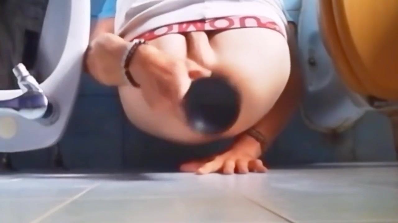 Young Man Plays With His Huge Dildo