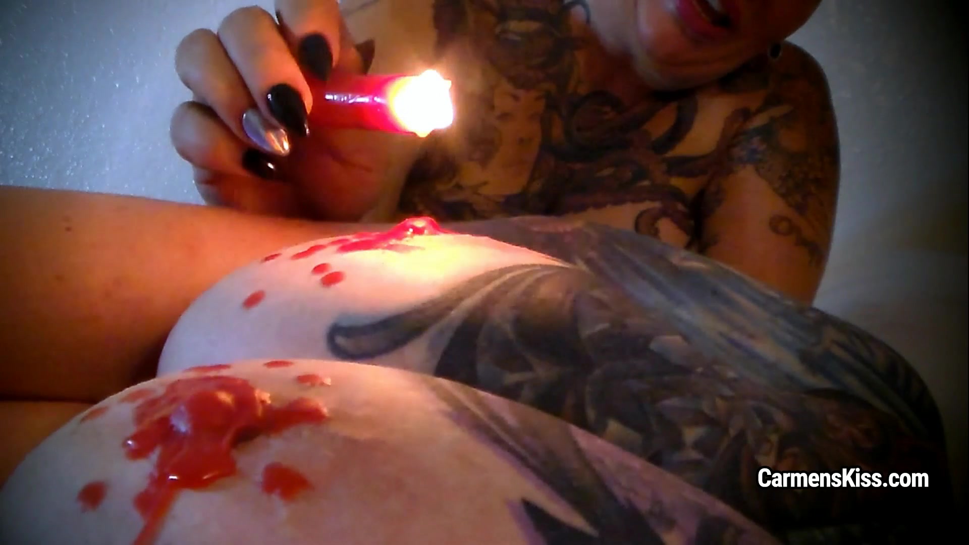Mistress Carmen De La Vega trickles girl's pierced tits with lamp-wax