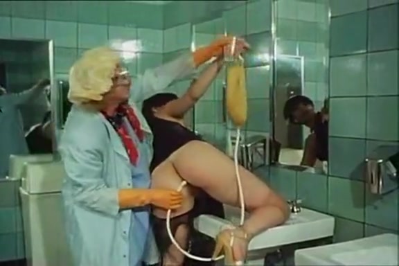 Desiree Cousteau in vintage sex movie with nasty sex in the toilet