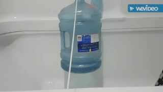 Hanging water jug off my balls