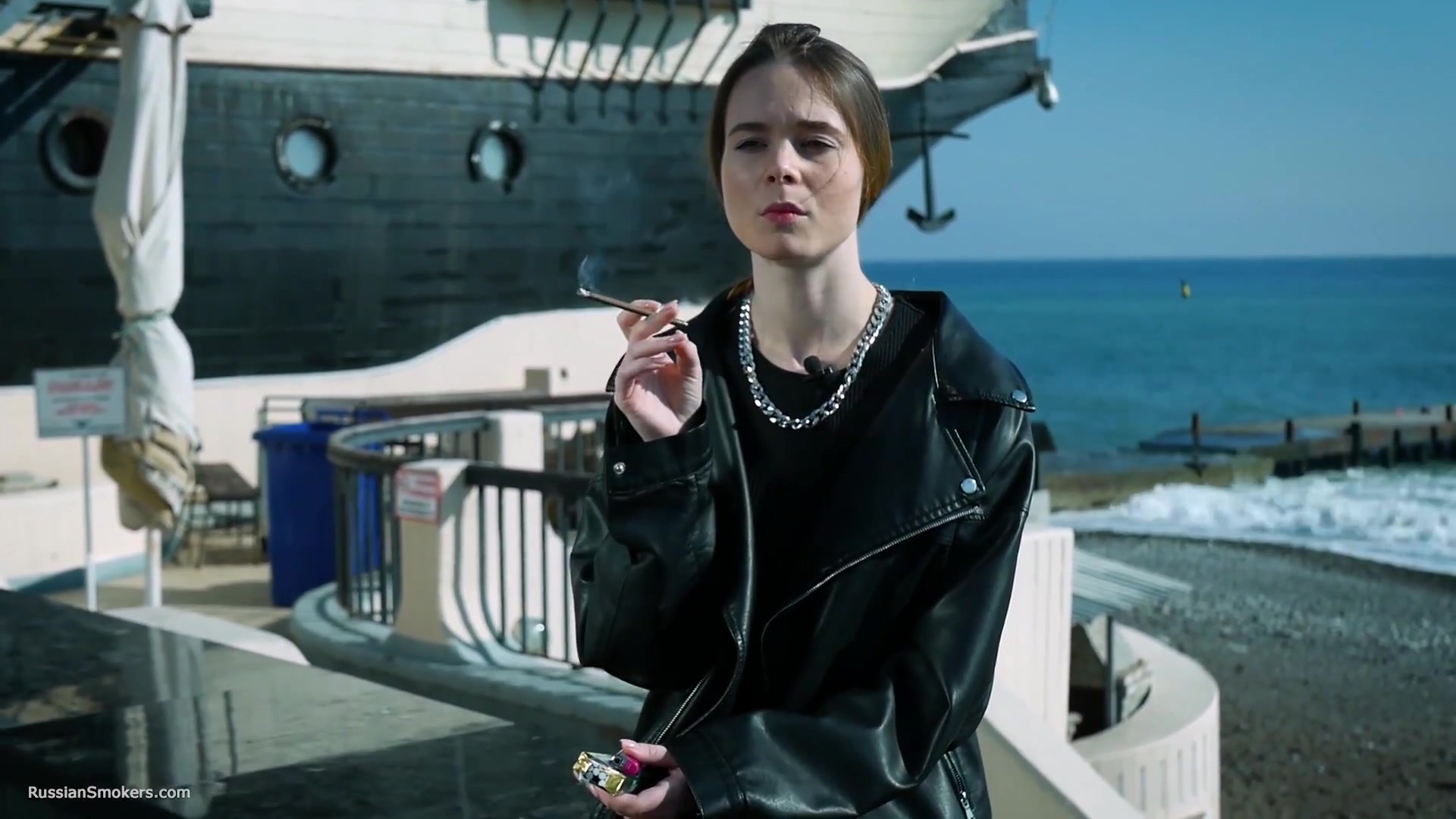 Smoking Strong Brown 120mm Cigarette Near The Beach