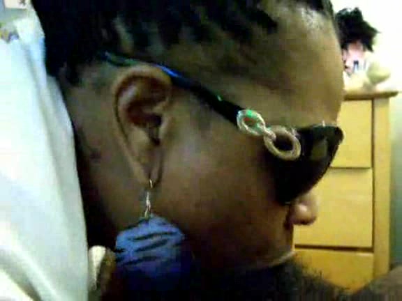 Black slut with sunglasses takes cock deep in her mouth