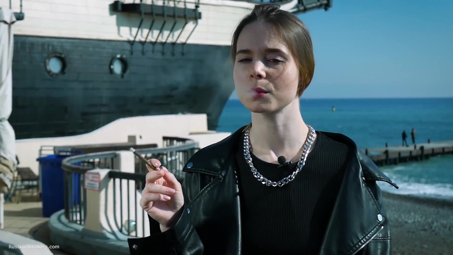 Smoking Strong Brown 120mm Cigarette Near The Beach
