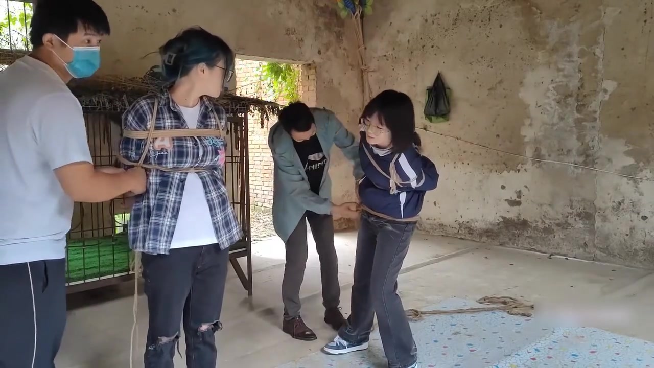 Two Girls Suspended In An Abandoned House