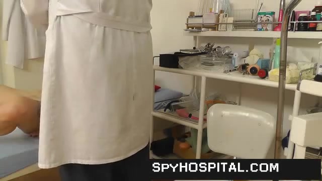 Woman patient videotaped by doctor