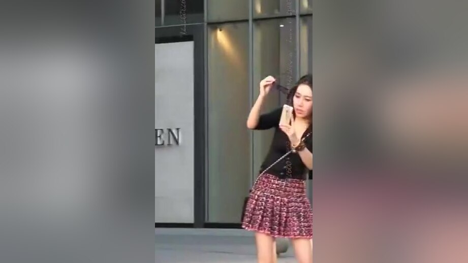 Chinese girl in short skirt