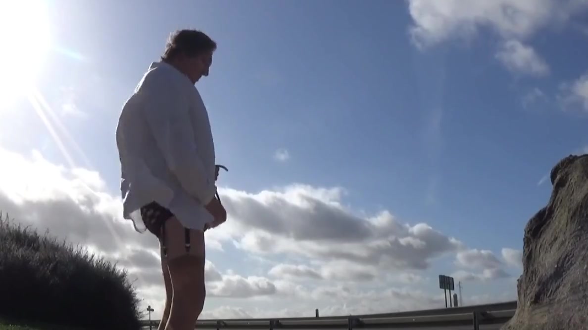 Crossdresser Sissy On A Road Parking Lot Sounding In Garter