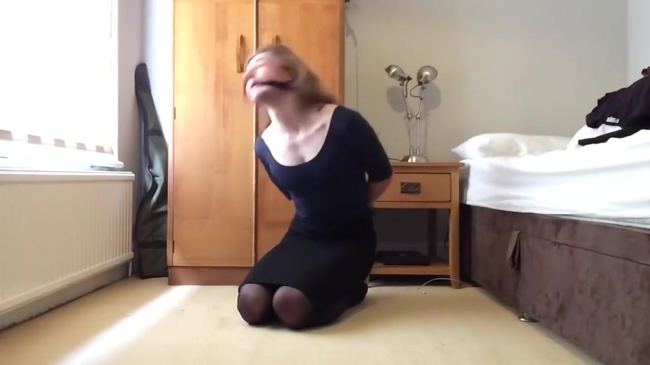 Crossdresser Bound and Gagged