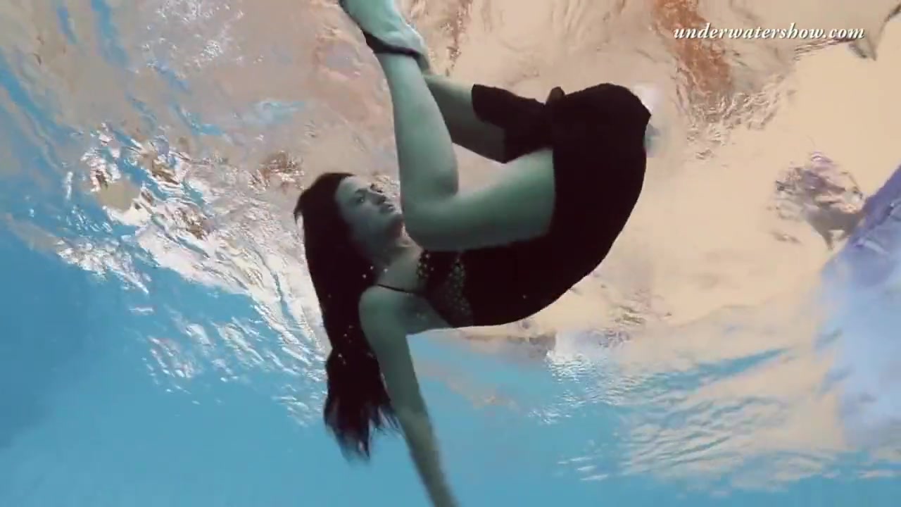 Gypsy Black Haired Babe Swimming Underwater