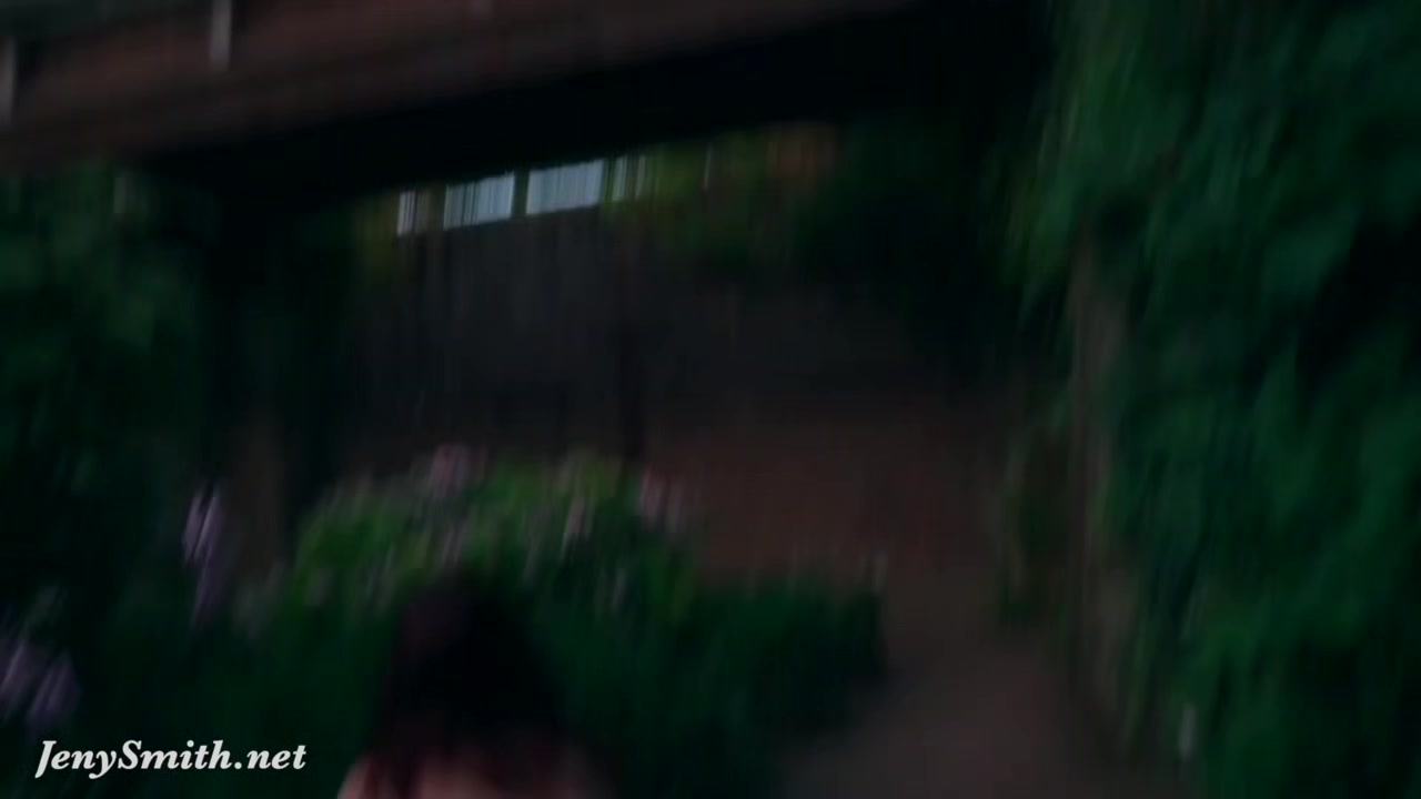 Jeny Smith is walking naked through an abandoned factory.