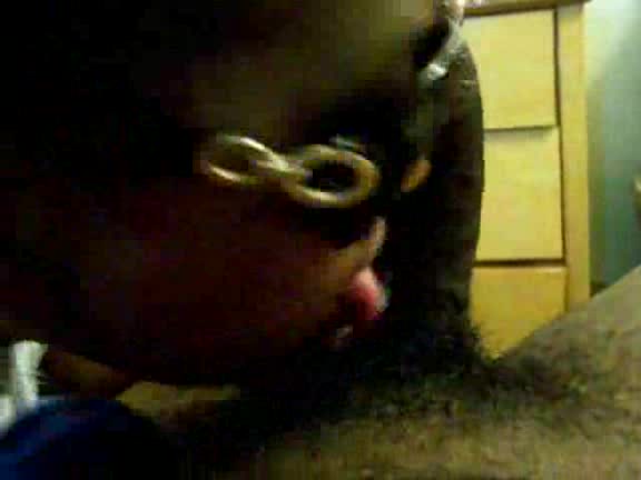 Black slut with sunglasses takes cock deep in her mouth