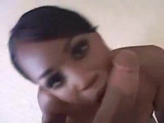 Snazzy ebony puts long cock in her deep mouth