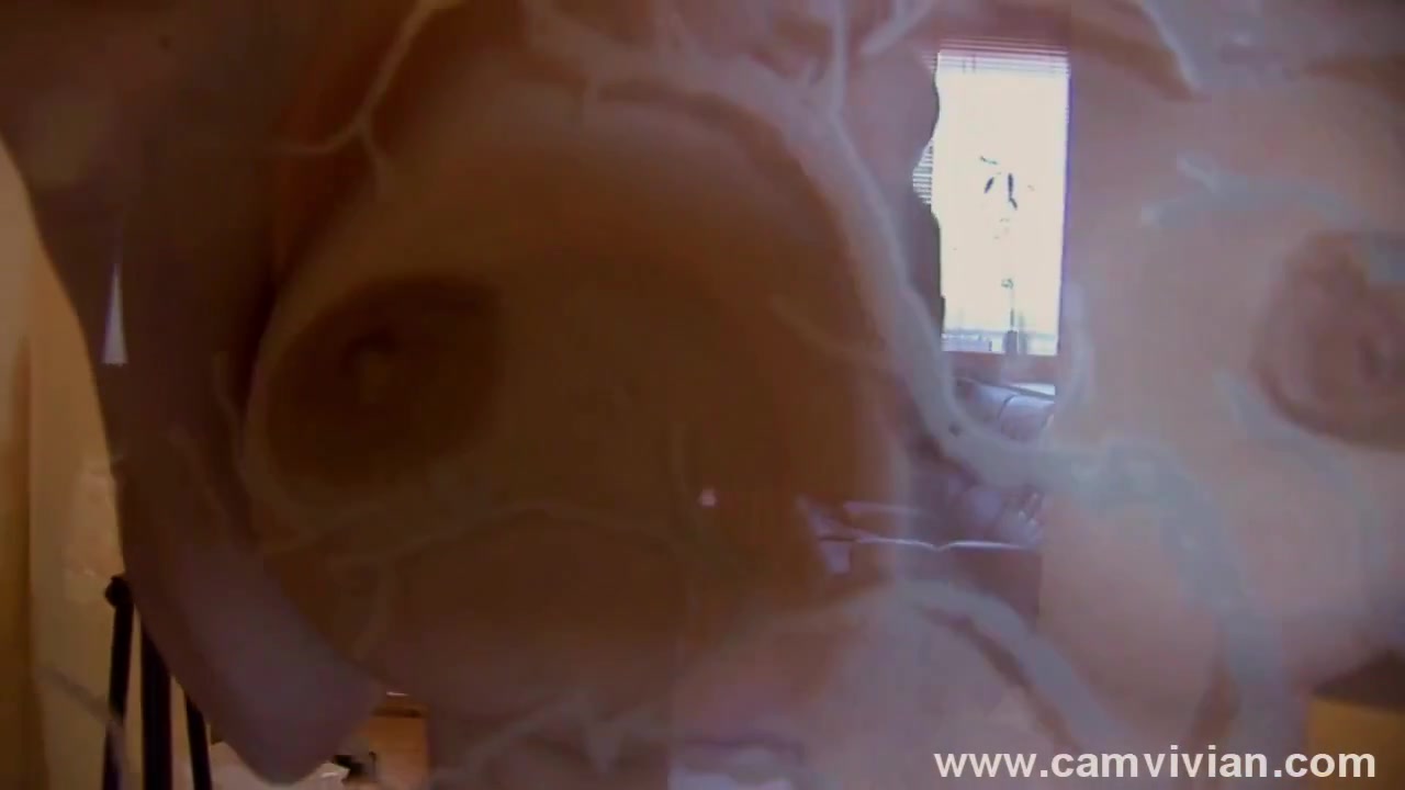 Showing Off My Nude Body Against A Glass Panel