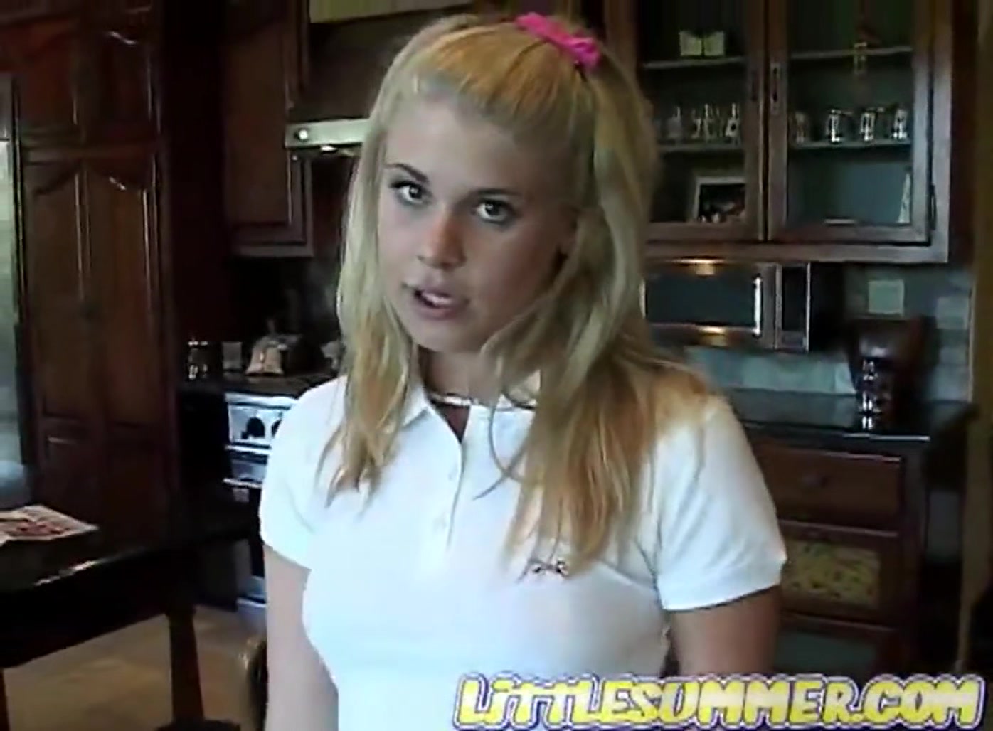 Cute blonde teen enjoys solo masturbation