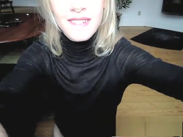 Kate May In A black suit On The Floor With A dildo