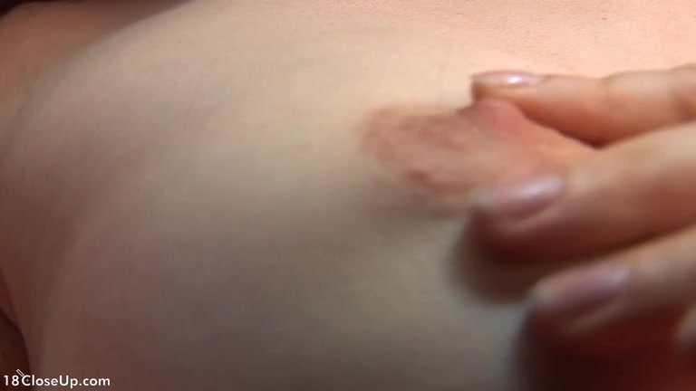 18yo Lisa Caresses her Nice Firm Boobs