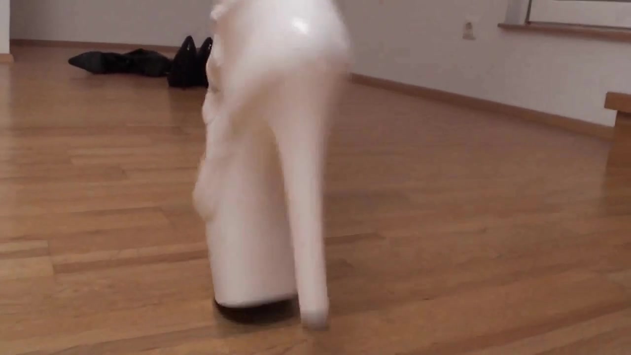 Busty blonde MILF tries out some shoes by Foot Girls