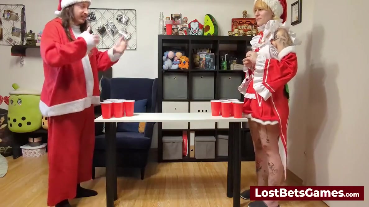 A Tattooed Woman Is Giving Her Boyfriend A Nice Christmas Blowjob