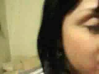 Latina smiles in the camera before taking cock in her tight mouth