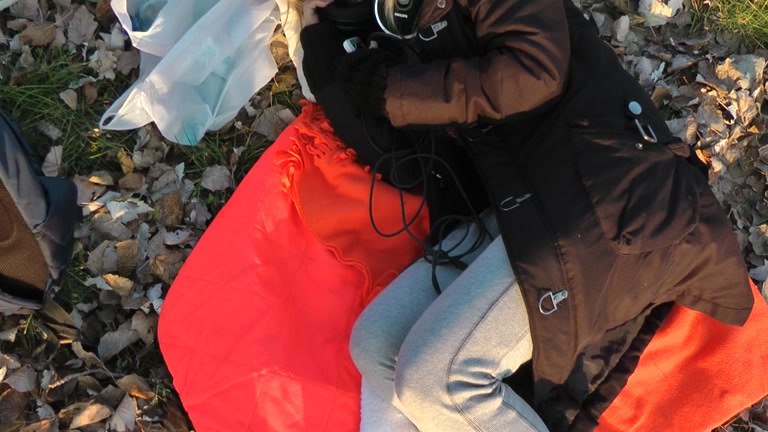 Blonde sucking near the lake