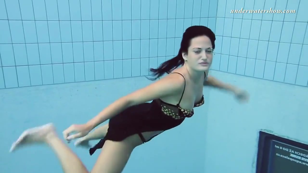 Gypsy Black Haired Babe Swimming Underwater