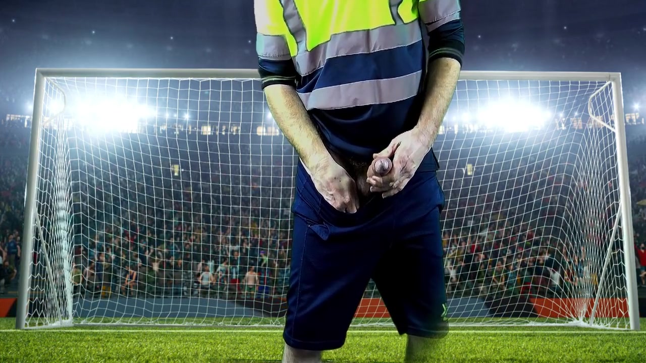 Victorious Goalkeeper Celebrates With Champagne At Big Match