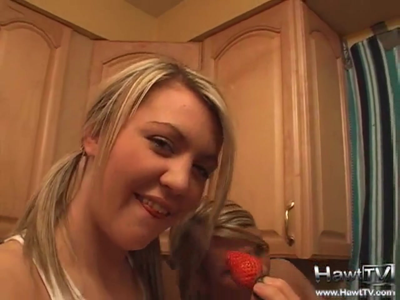 Lesbian teens licking strawberries and chocolate