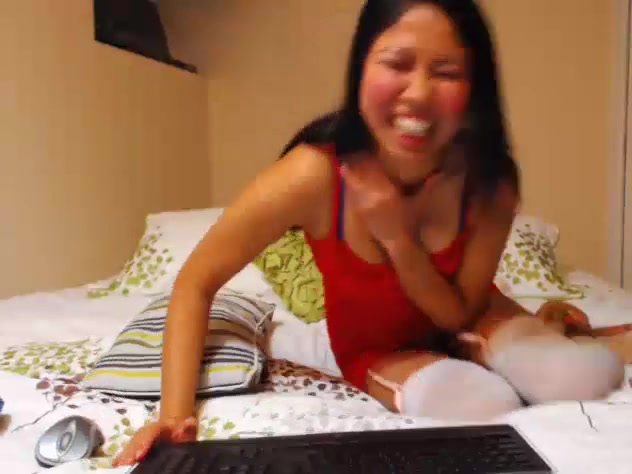 Playful brunette flashing her tits and playing with her toys