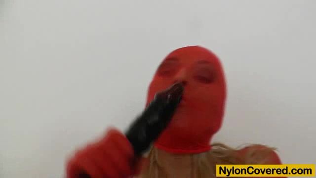 Distorted nylon mask face and stunning legs