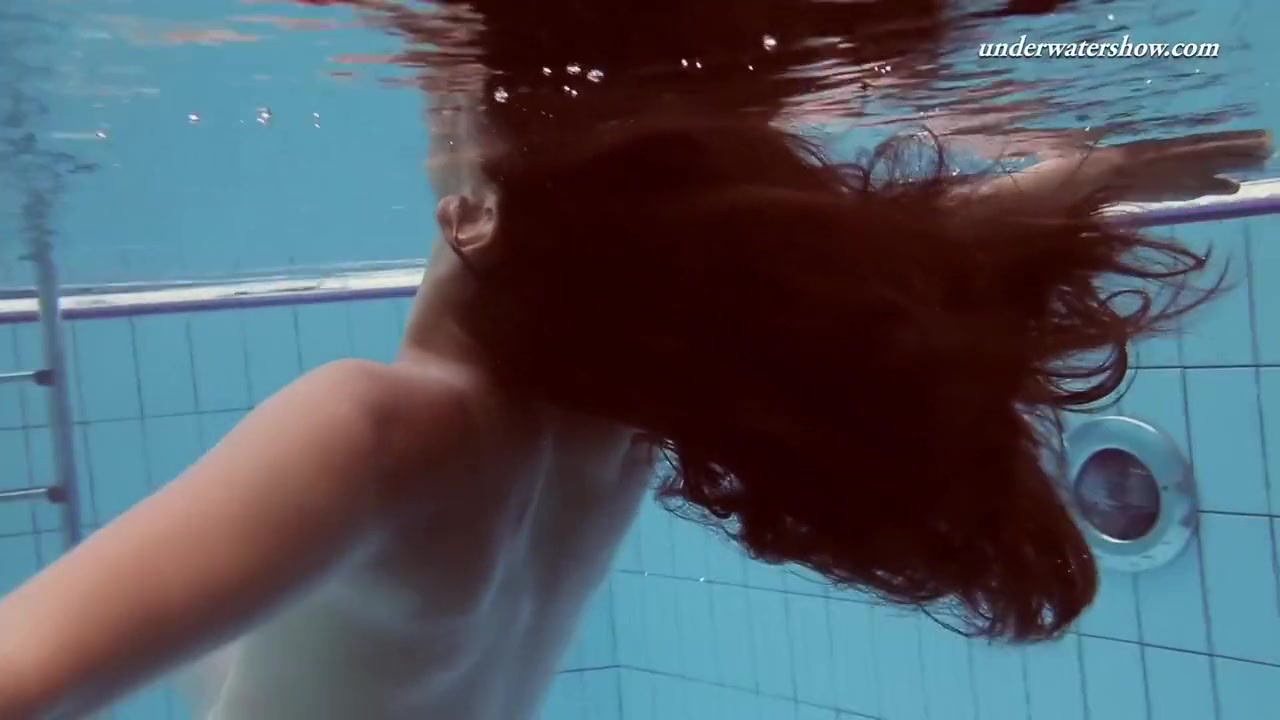 Sensational Sima Lastova In Poolside Swim Session