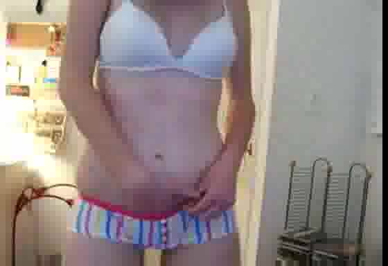 Pussycat poses in front of the webcam in stripped undies