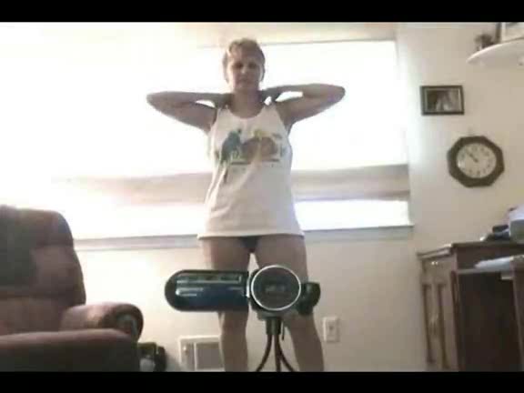 Appealing wench undresses in front of a amateur cam