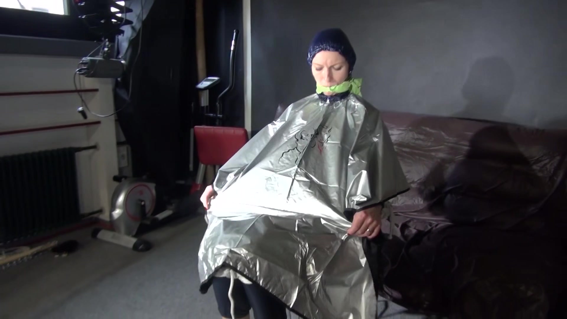 Sexy Ronja Being Tied, Gagged And Hooded On A Chair With A Clothgag Wearing Sexy Blue Shiny Nylon Rainwear (Video)
