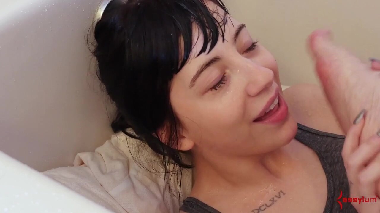 Goth Charlotte gags on cock while bound