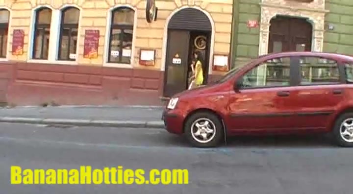 She shows her naked body at the public street