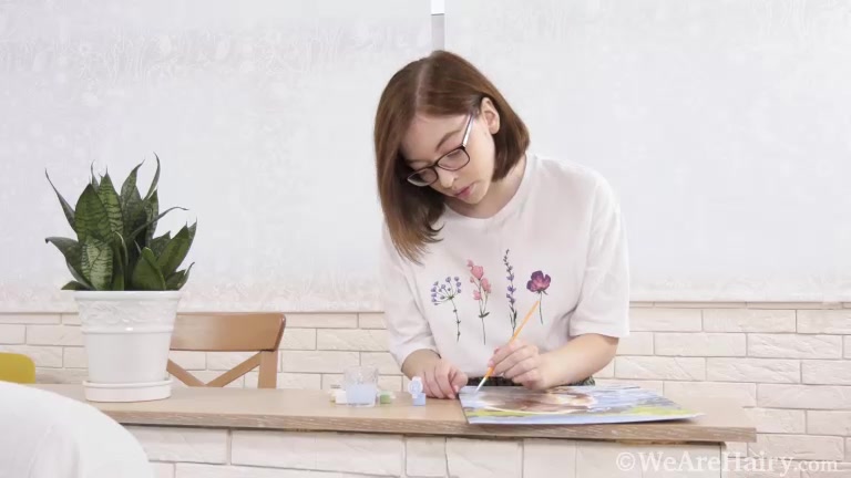Abby enjoys her artwork and then her orgasms