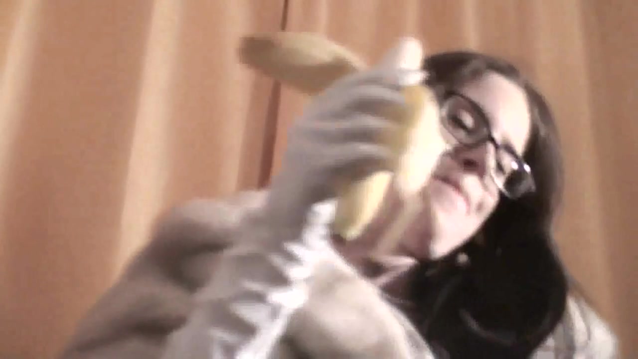 Spex brunette talking dirty while eating banana by Femdom Austria