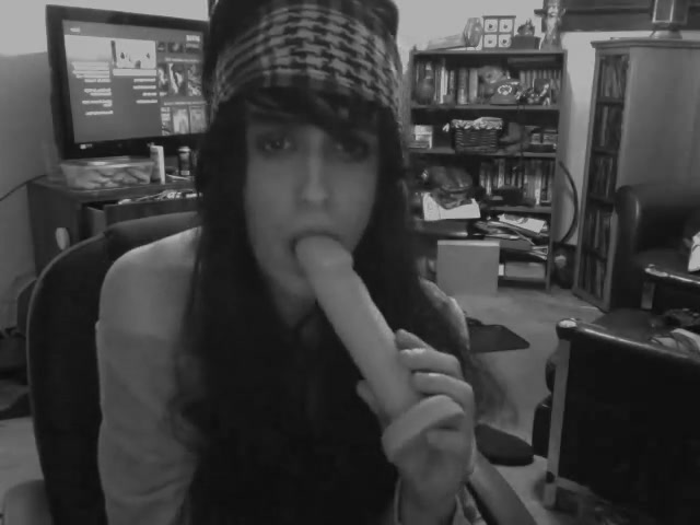Crossdresser sucking dildo