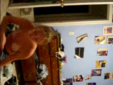 Blonde young girl taking her clothes off slowly