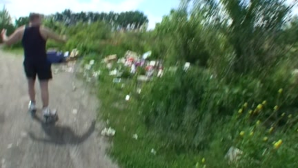 Gal on roller skates engulf on the bike path