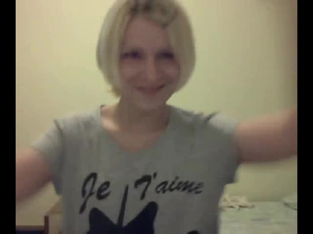 Cute blonde shows her tits on cam