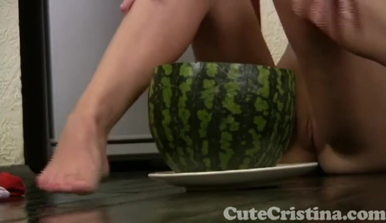 Cute Cristina plays naked with watermelon